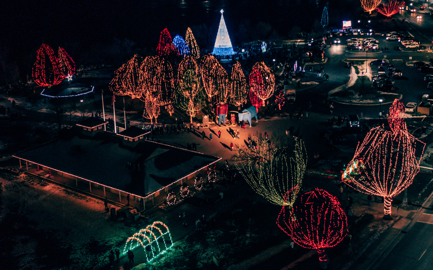 Ariel shot of Paul Bunyan park illuminated with Christmas lights.