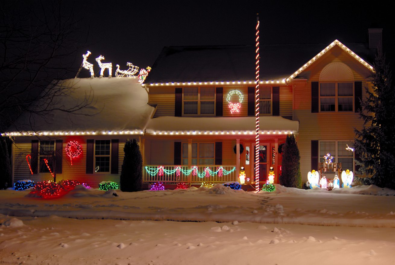 Home with Christmas lights and decorations.