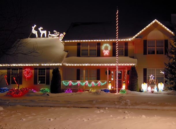 Home with Christmas lights and decorations.